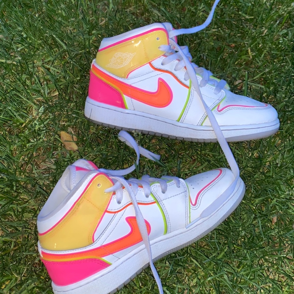 Orange pink and yellow neon Jordan’s size 4.5 kids.  Will consider offers
